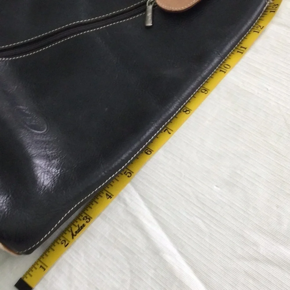 Woman’s Bag Style by Vera Pelle Shoulder Strap zips to convert to a Backpack.